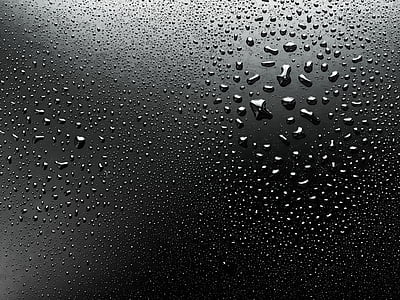 water dew on black surface thumbnail