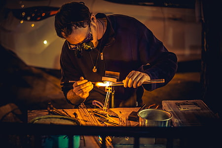 man fixing at room thumbnail