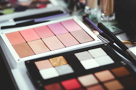 selective focus photography of eyeshadow palettes thumbnail