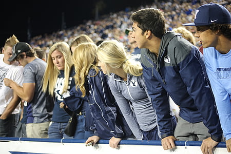 group of people gathered inside stadium thumbnail