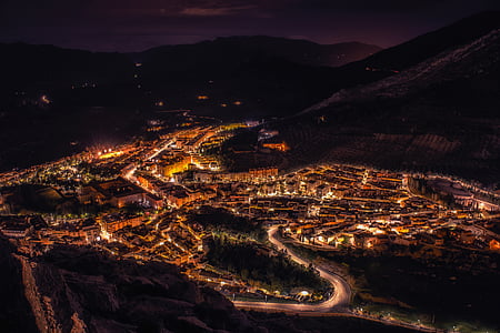 aerial view of buildings at night time thumbnail