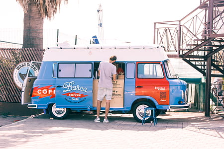 man standing in front of Barca Coffee van outdoor thumbnail
