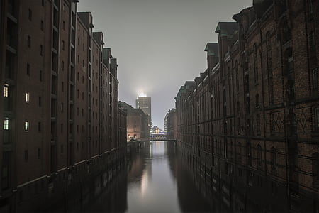 photo of city buildings during nighttime thumbnail