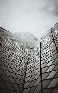 curtain wall building under white sky thumbnail