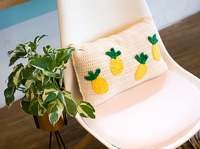 white chair with pillow thumbnail