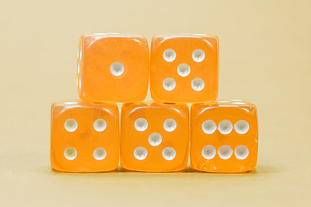 four orange dices thumbnail