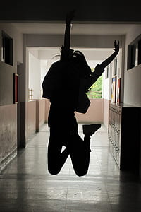 silhouette of woman jumping thumbnail