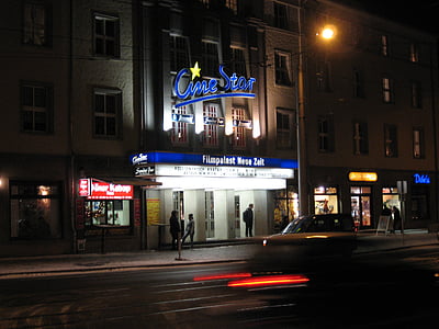 people standing near Cine Star building thumbnail