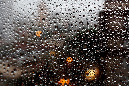 Full Frame Shot of Raindrops on Glass Window thumbnail