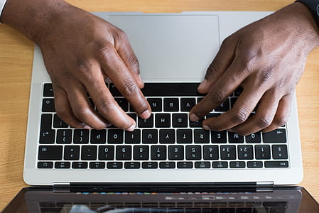 Person Typing on Laptop thumbnail