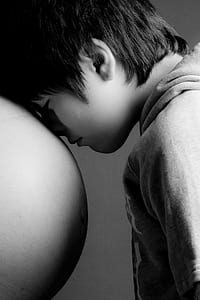 grayscale photography of boy thumbnail