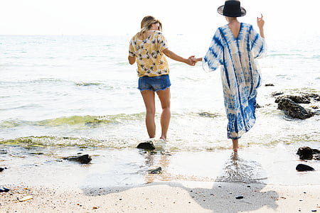 woman wearing white and blue dress on seashore thumbnail