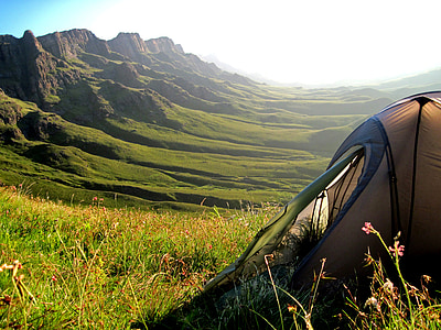 gray and green dome tent on green grass thumbnail