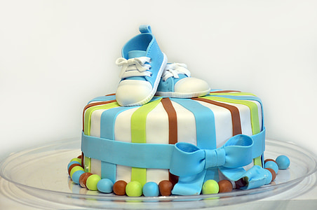 round striped cake decor with pair of blue shoes thumbnail