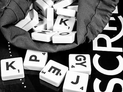 scrabble tiles in black drawstring pouch thumbnail