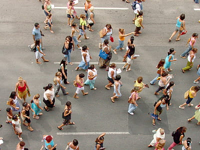 group of people walking on pavement thumbnail