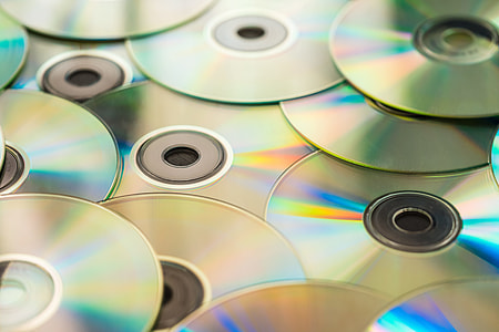 Pile of CD Compact Discs and DVDs #2 thumbnail