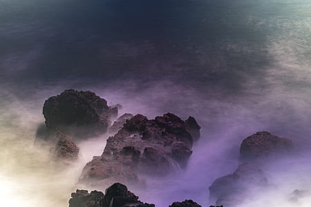aerial photography of ocean and rock thumbnail