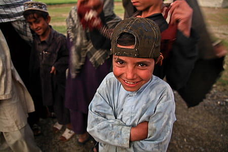 boy wearing blue long-sleeved top thumbnail