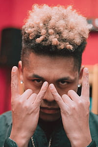 man doing a hand gesture thumbnail