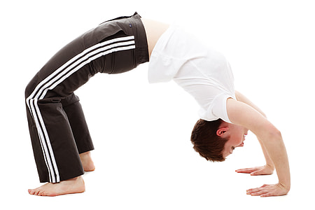 boy in white shirt and black track pants thumbnail