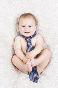 baby wearing blue necktie thumbnail