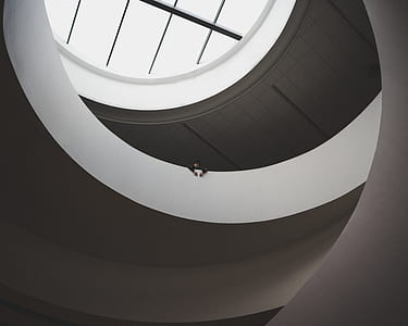high angle view photography of person on top of white concrete floor thumbnail