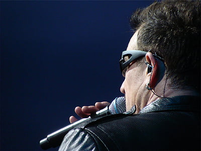 man holding black wireless microphone thumbnail