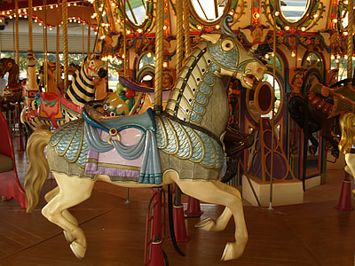 photo of beige and green horse carousel thumbnail