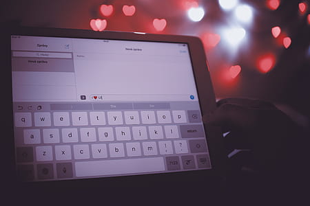 Valentine’s Day, Detail of screen of tablet with a message “I love you” thumbnail