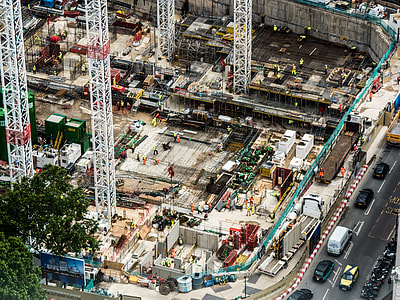 above view photo of unfinished structure with workers thumbnail