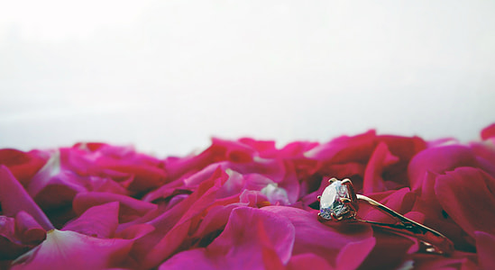 silver-colored ring with clear gemstone thumbnail