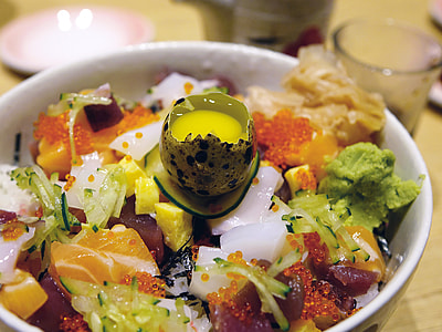 vegetable salad with quail egg on round white ceramic bowl close-up photo thumbnail