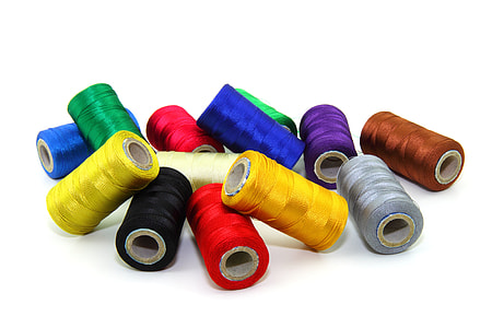 photograph of assorted-color thread spool lot thumbnail