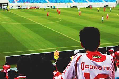 man watching soccer in game thumbnail