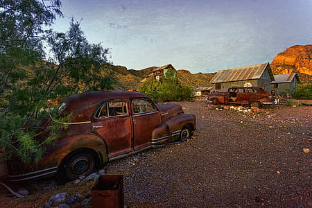 two brown classic sedans thumbnail