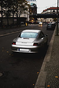 silver coupe car parked beside the street thumbnail