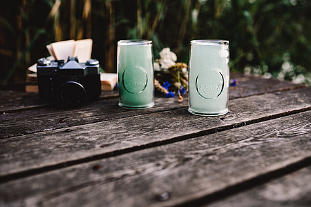 Colorful smoke bomb, book and vintage camera thumbnail