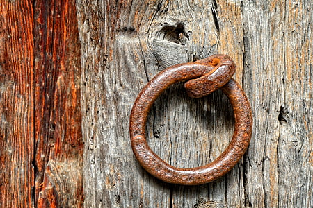 round brown metal door knocker thumbnail