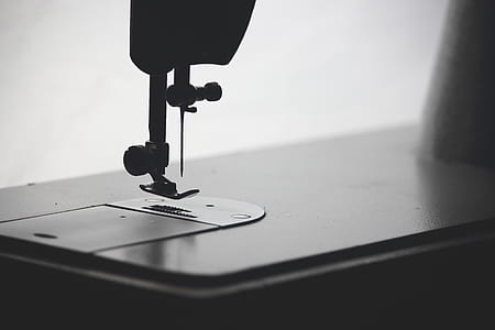 shallow focus photography of sewing machine thumbnail