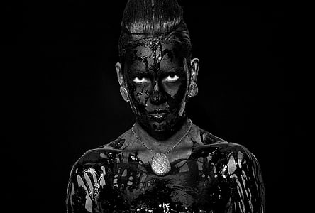 woman with black body paint thumbnail