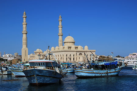 boats near mosque thumbnail