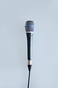 black and gray dynamic microphone on gray surface thumbnail