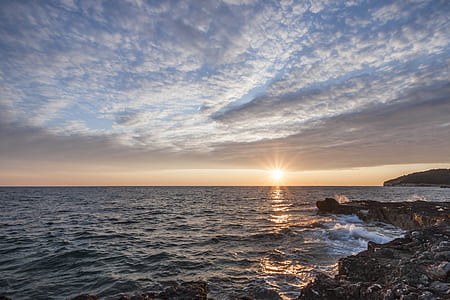 Black Rock Beside the Sea Under the Sunset thumbnail