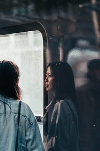 woman in front of window thumbnail