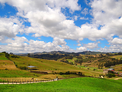 Village in the foothills landscape with sky and clouds in Nepal thumbnail