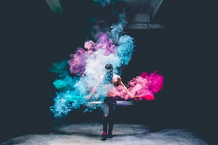 photo of man surrounded by colored powder thumbnail