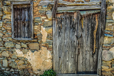 closed black wooden door thumbnail