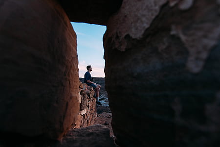 man sitting on during daytime thumbnail