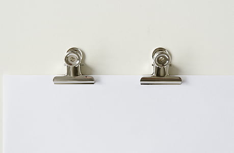 two grey clips on paper thumbnail
